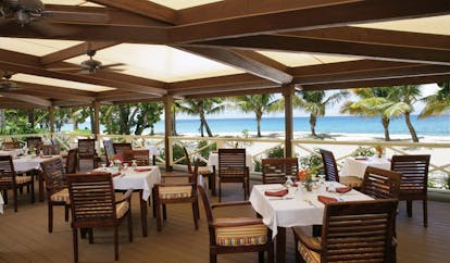 Galley Bay Antigua Ismays restaurant indoor dining modern décor overlooking beach