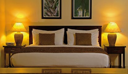 Galley Bay Antigua suite bedroom bed lamps modern décor