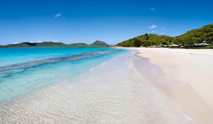 Hermitage Bay Antigua beach white sandy beach clear blue ocean