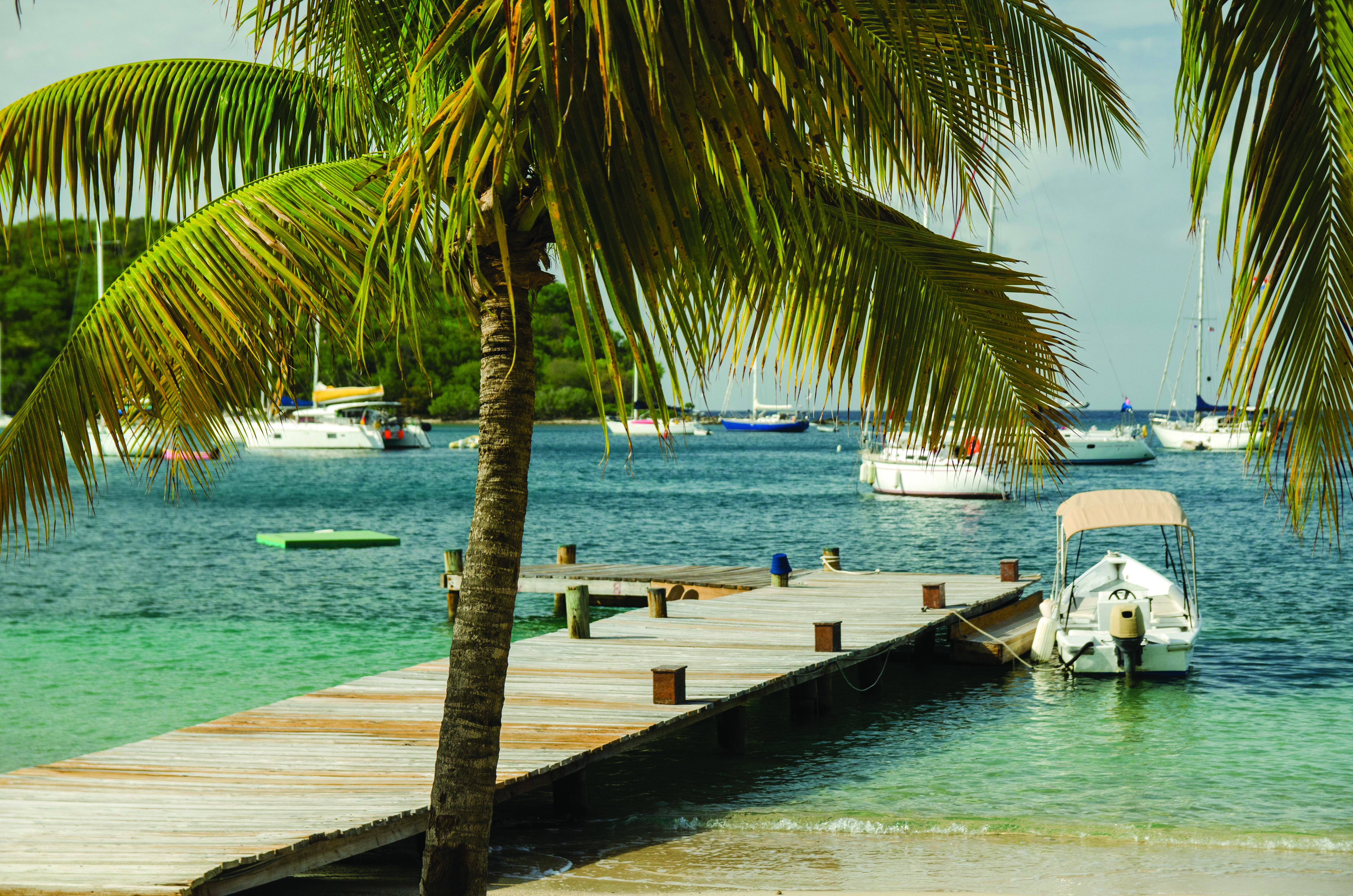 Inn at English Harbour Antigua beach jetty ocean palm trees boats