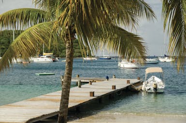 Inn at English Harbour Antigua beach jetty ocean palm trees boats