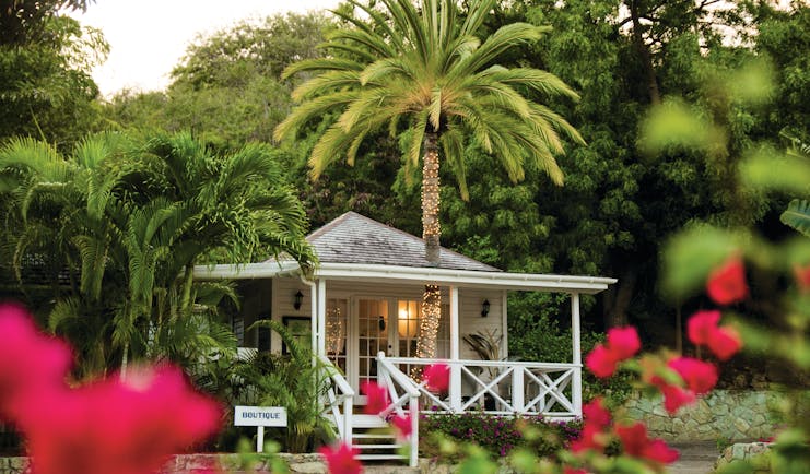 Inn at English Harbour Antigua boutique veranda palm trees red flowers