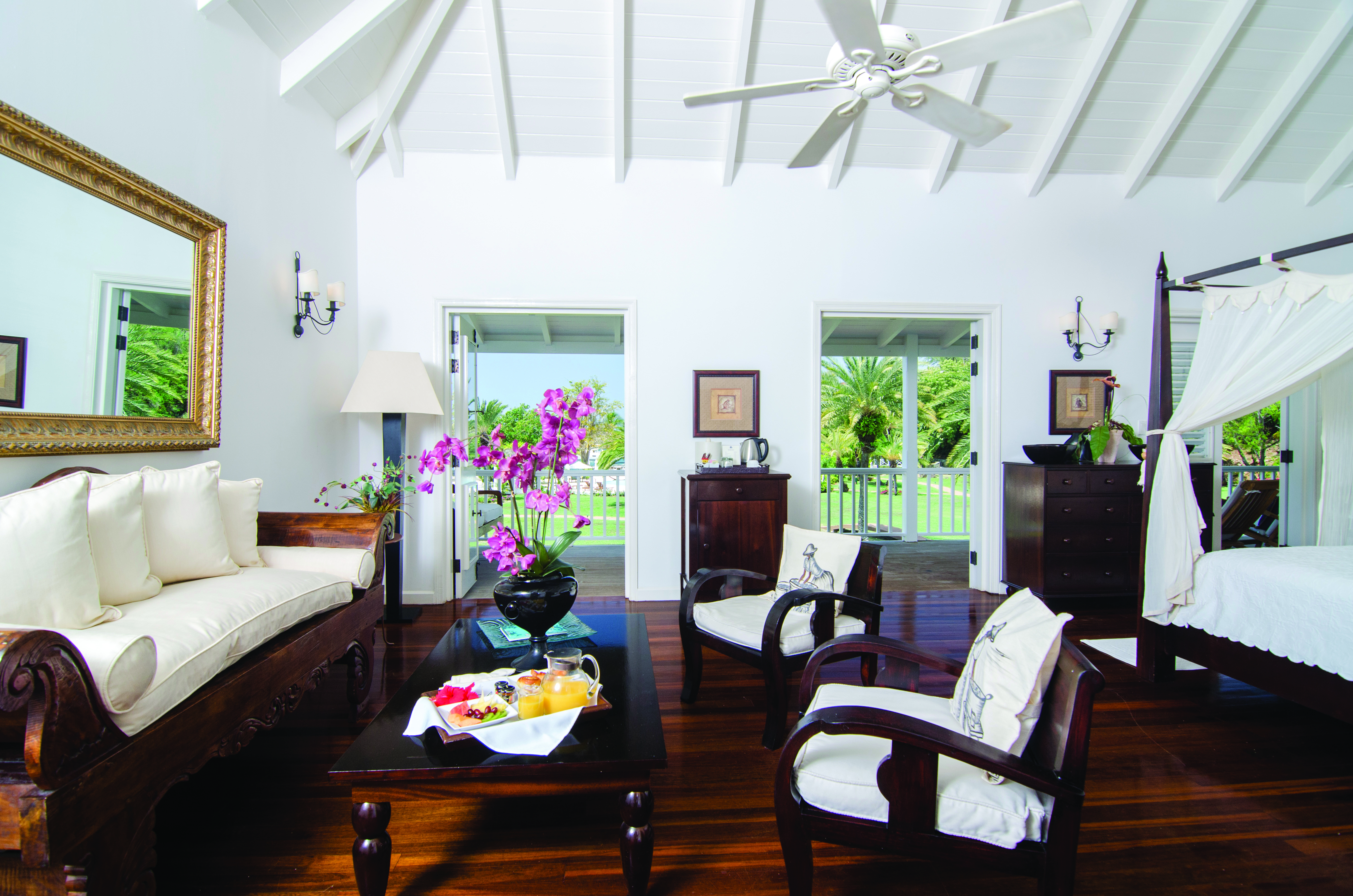Inn at English Harbour Antigua deluxe junior suite lounge area terrace with garden views