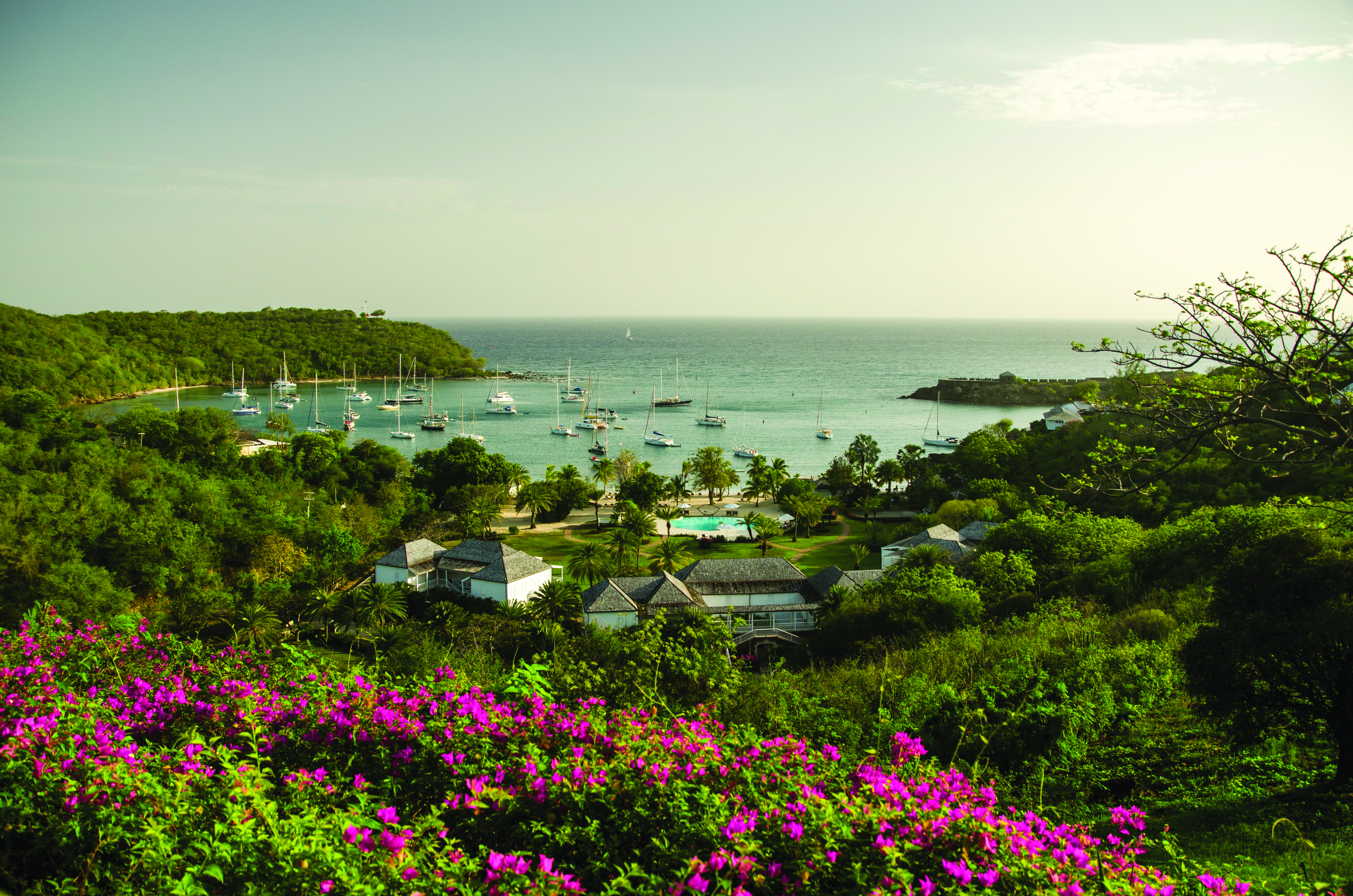 Inn at English Harbour Antigua scenery hotel complex overlooking sea boats on the water