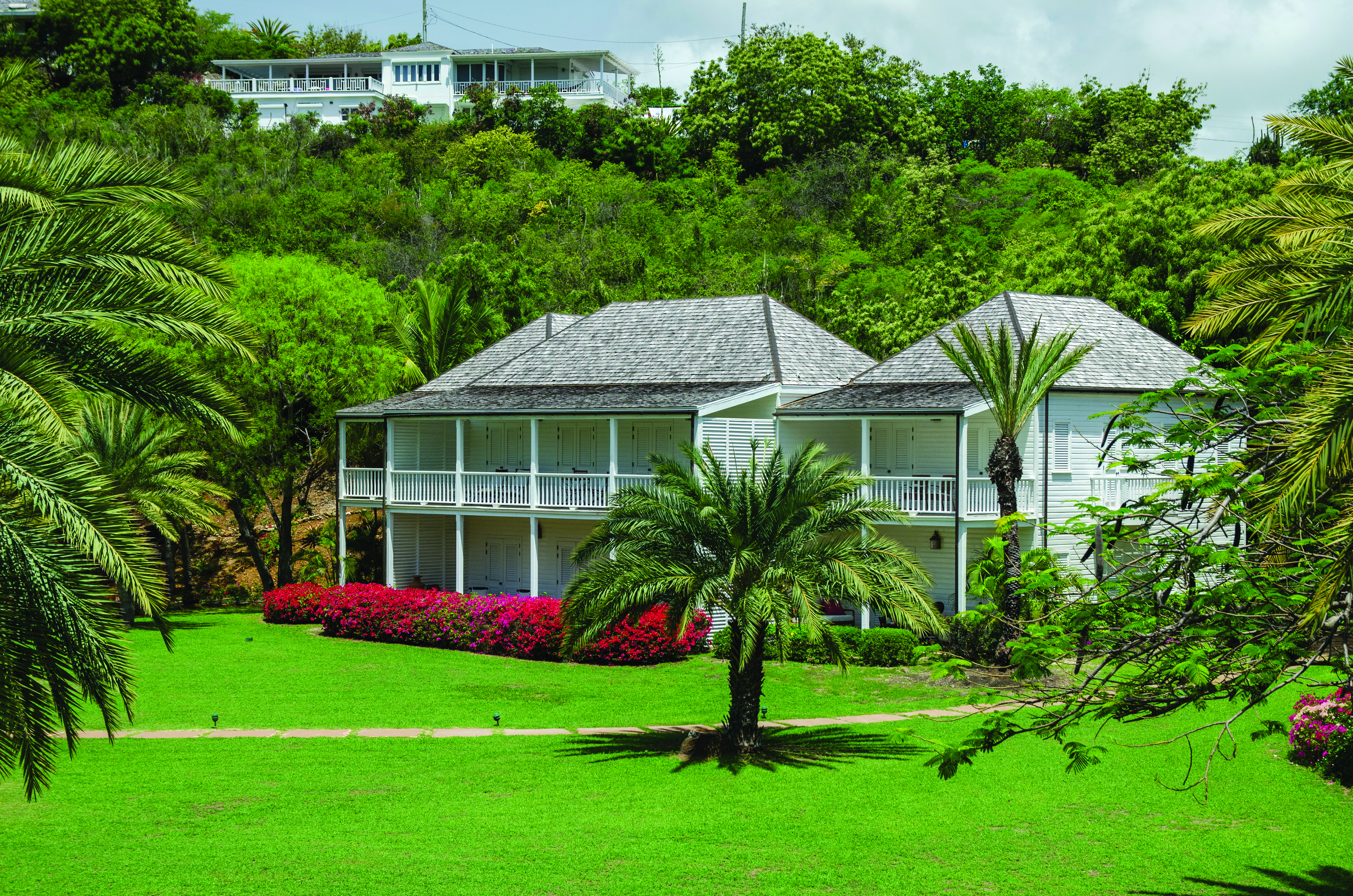 Inn at English Harbour Antigua exterior view palm trees lawn