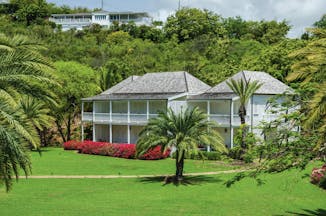 Inn at English Harbour Antigua exterior view palm trees lawn