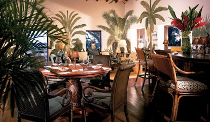 Jumby Bay Antigua estate house bar indoor seating area elegant décor