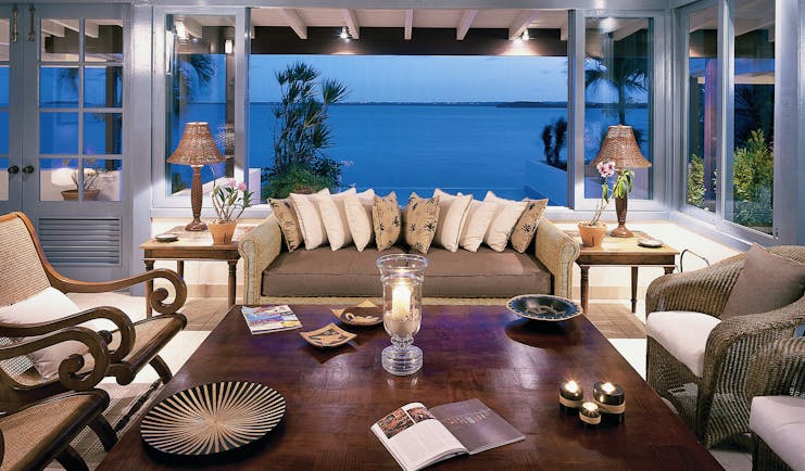 Jumby Bay Antigua villa lounge sofa armchairs sea views