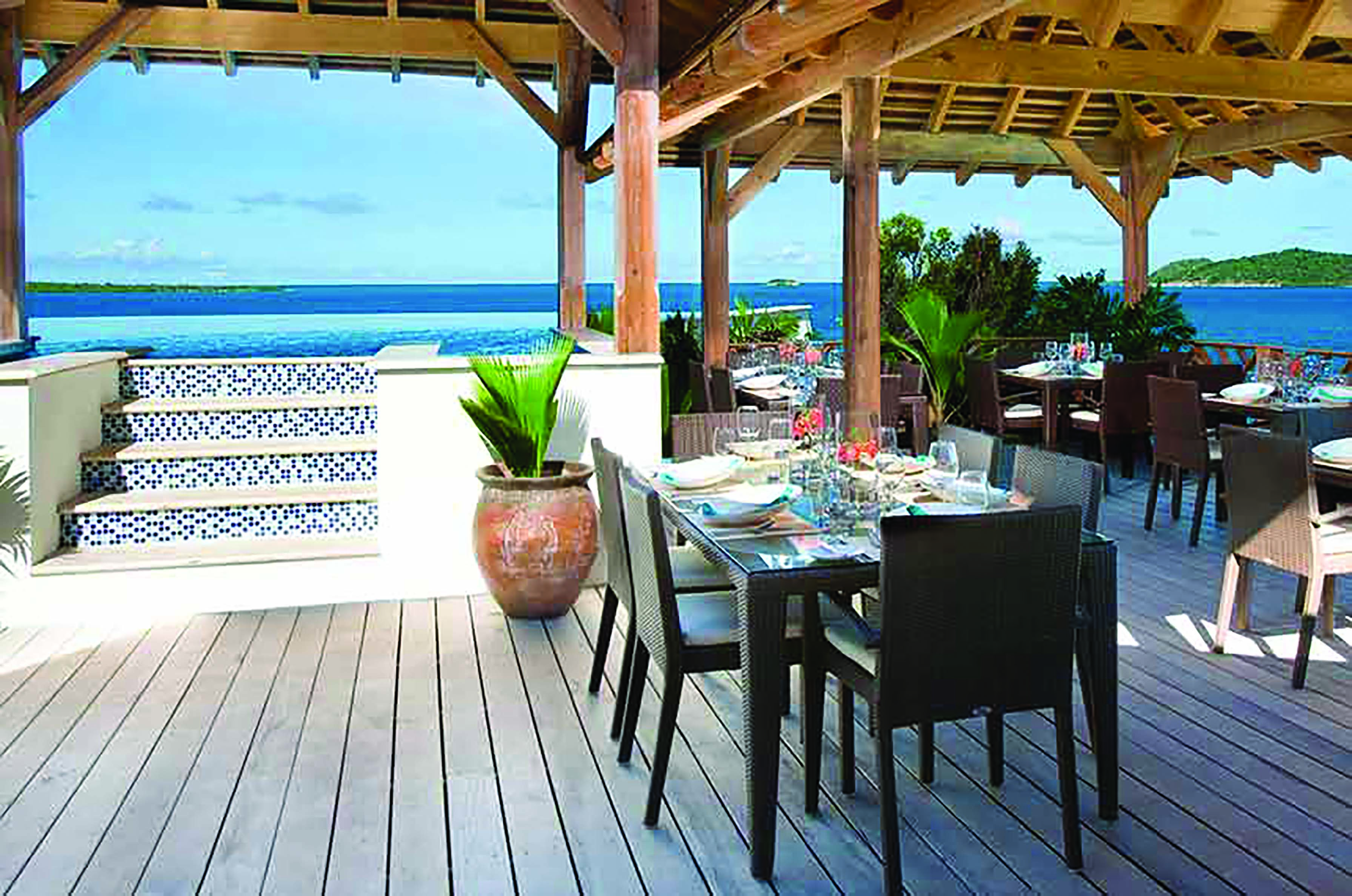 Nonsuch Bay Antigua dining overlooking ocean dining beside infinity pool