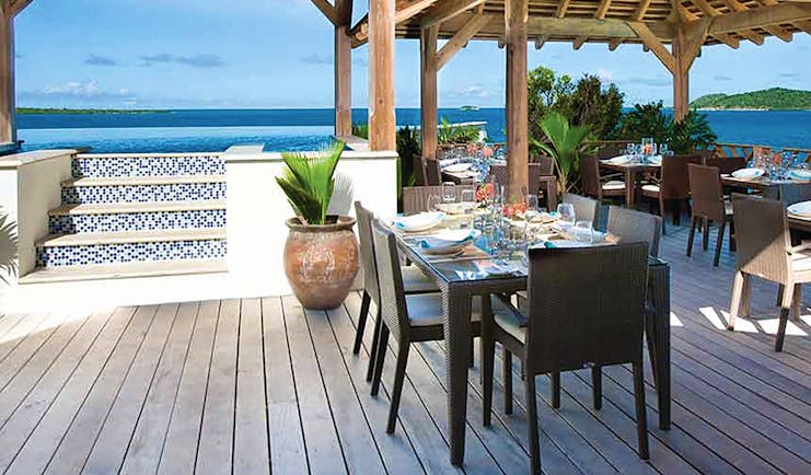 Nonsuch Bay Antigua dining overlooking ocean dining beside infinity pool