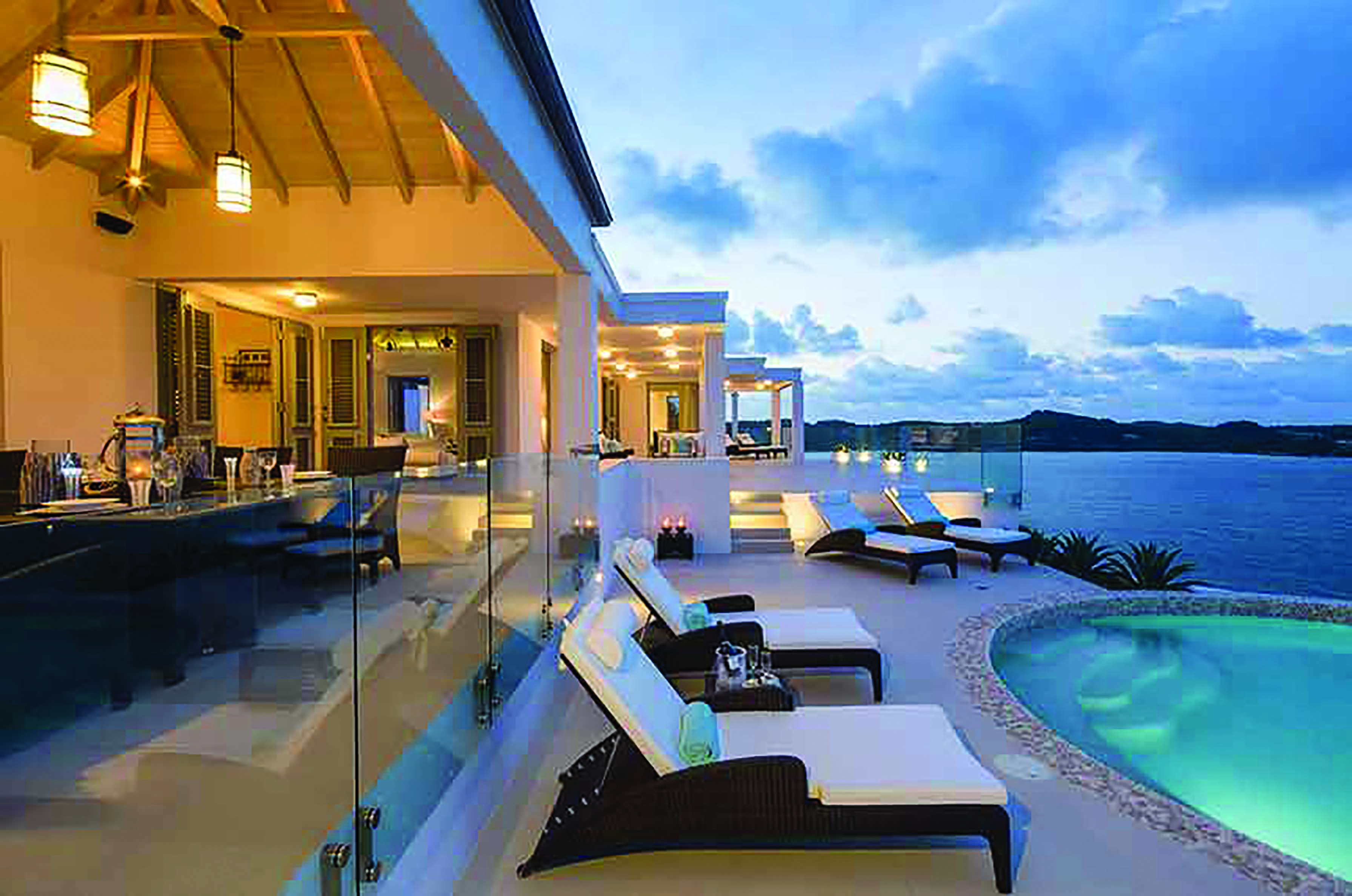 Nonsuch Bay Antigua pool area infinity pool sun loungers overlooking ocean