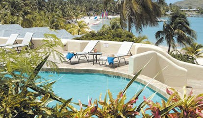 St James's Club Antigua adult pool sun loungers beach views