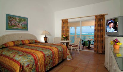 St James's Club Antigua premium bedroom bed access to private terrace overlooking sea