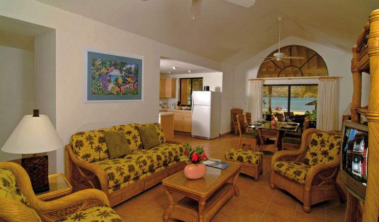 St James's Club Antigua villa lounge sofas armchairs dining table