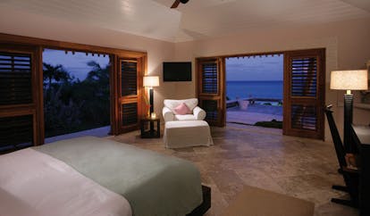 Pink Sands Bahamas bedroom ocean view armchair views of ocean and deck
