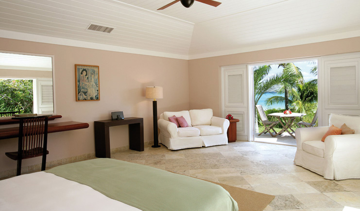 Pink Sands Bahamas ocean view cottage bedroom sofa armchair ocean view and garden terrace