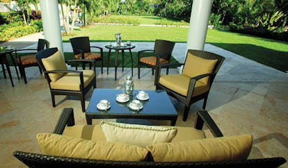 Four Seasons Ocean Club Bahamas boardroom patio seating area with coffee and gardens