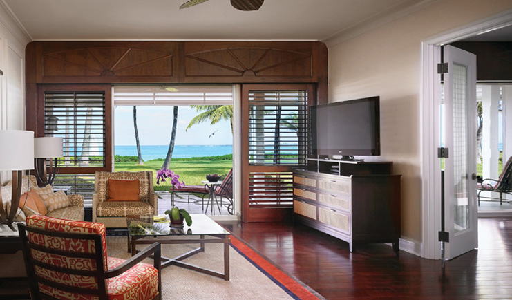 Four Seasons Ocean Club Bahamas Crescent wing lounge with sofa television terrace with ocean view