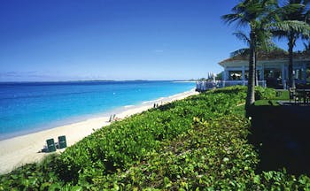 Four Seasons Ocean Club Bahamas beach view garden ocean loungers and bungalow