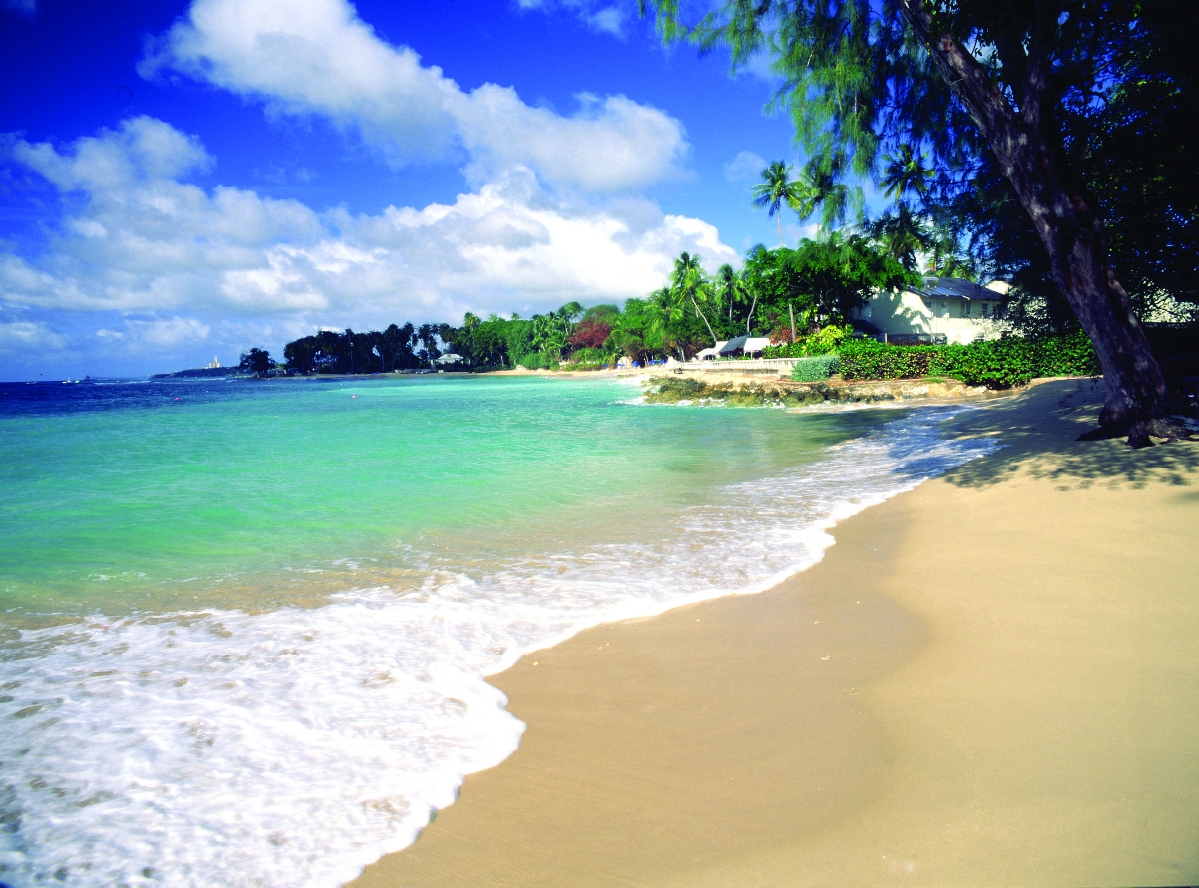Cobblers Cove Barbados beach waves rolling on to the sand