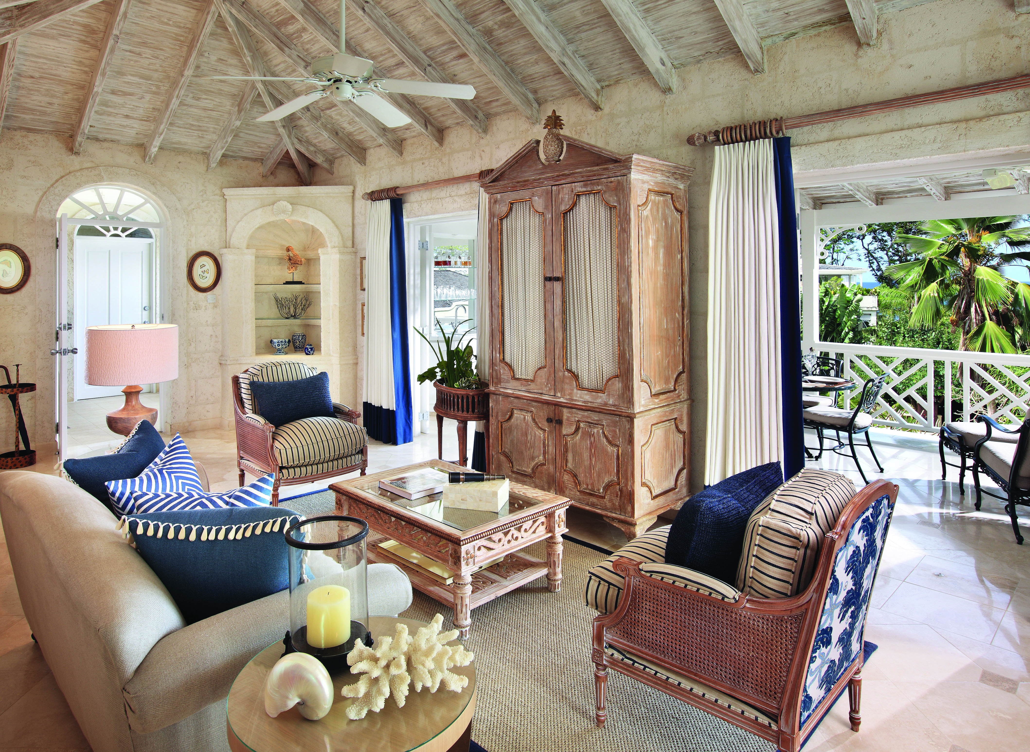 Coral Reef Club Barbados lounge indoor seating leading to outdoor terrace