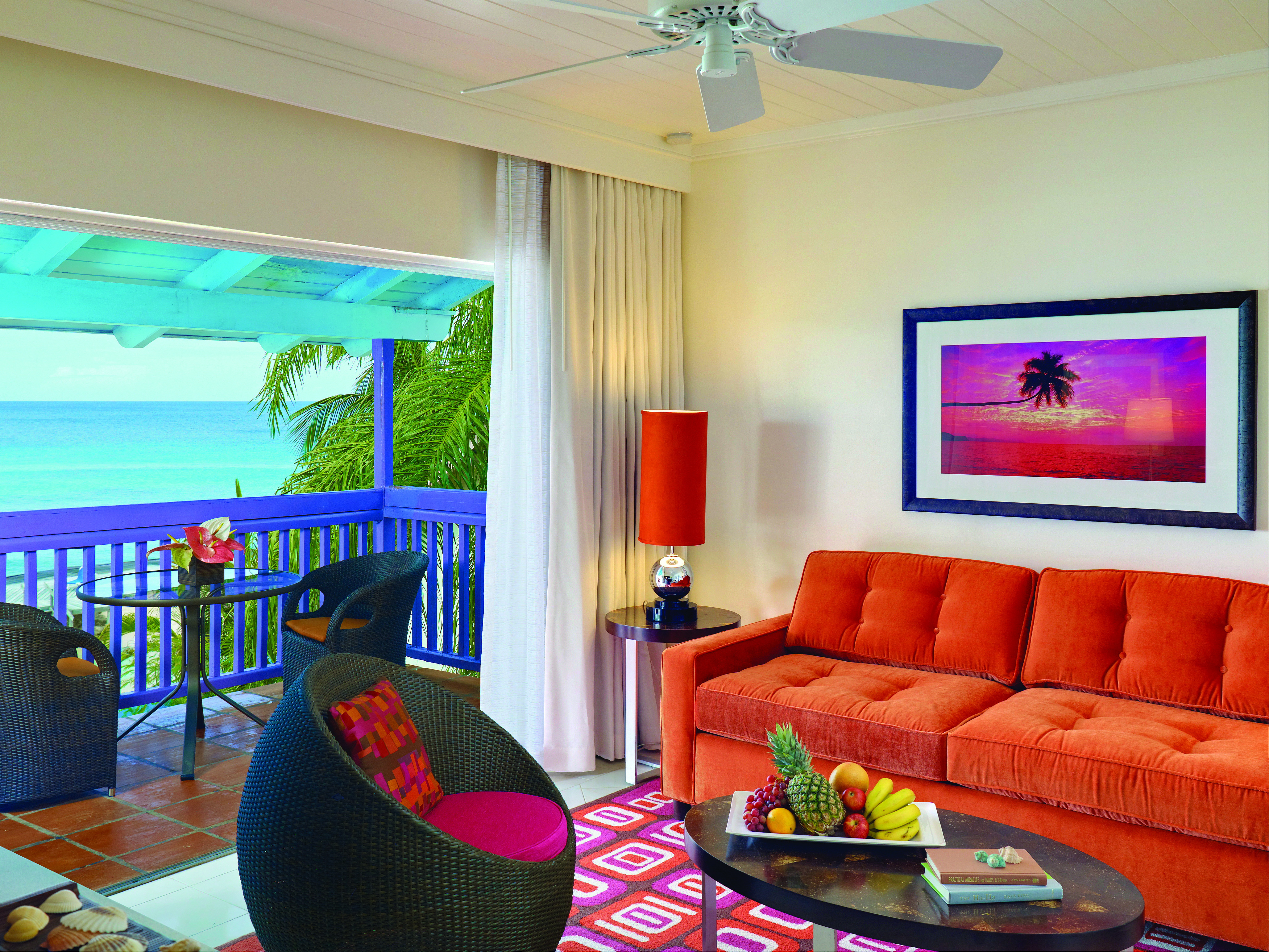Crystal Cove Barbados living room with balcony and ocean views