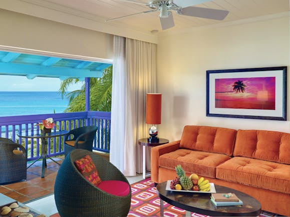 Crystal Cove Barbados living room with balcony and ocean views