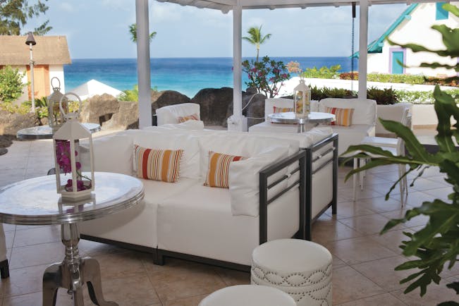Crystal Cove Barbados lounge area outside covered seating ocean views