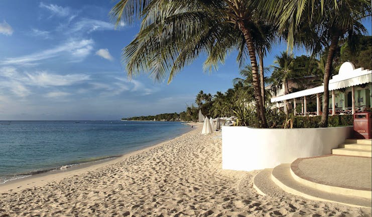 Fairmont Royal Pavilion Barbados beach entrance palm trees sandy beach