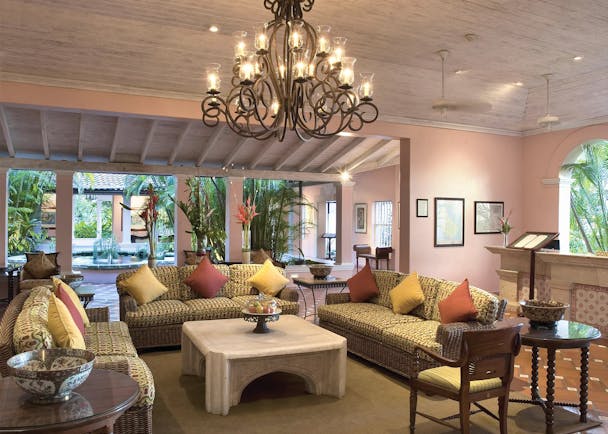 Fairmont Royal Pavilion Barbados lobby seating area with three sofas