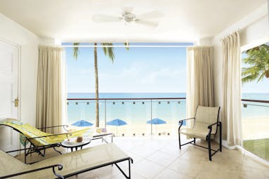 Fairmont Royal Pavilion Barbados lounge with views onto the beach and the ocean