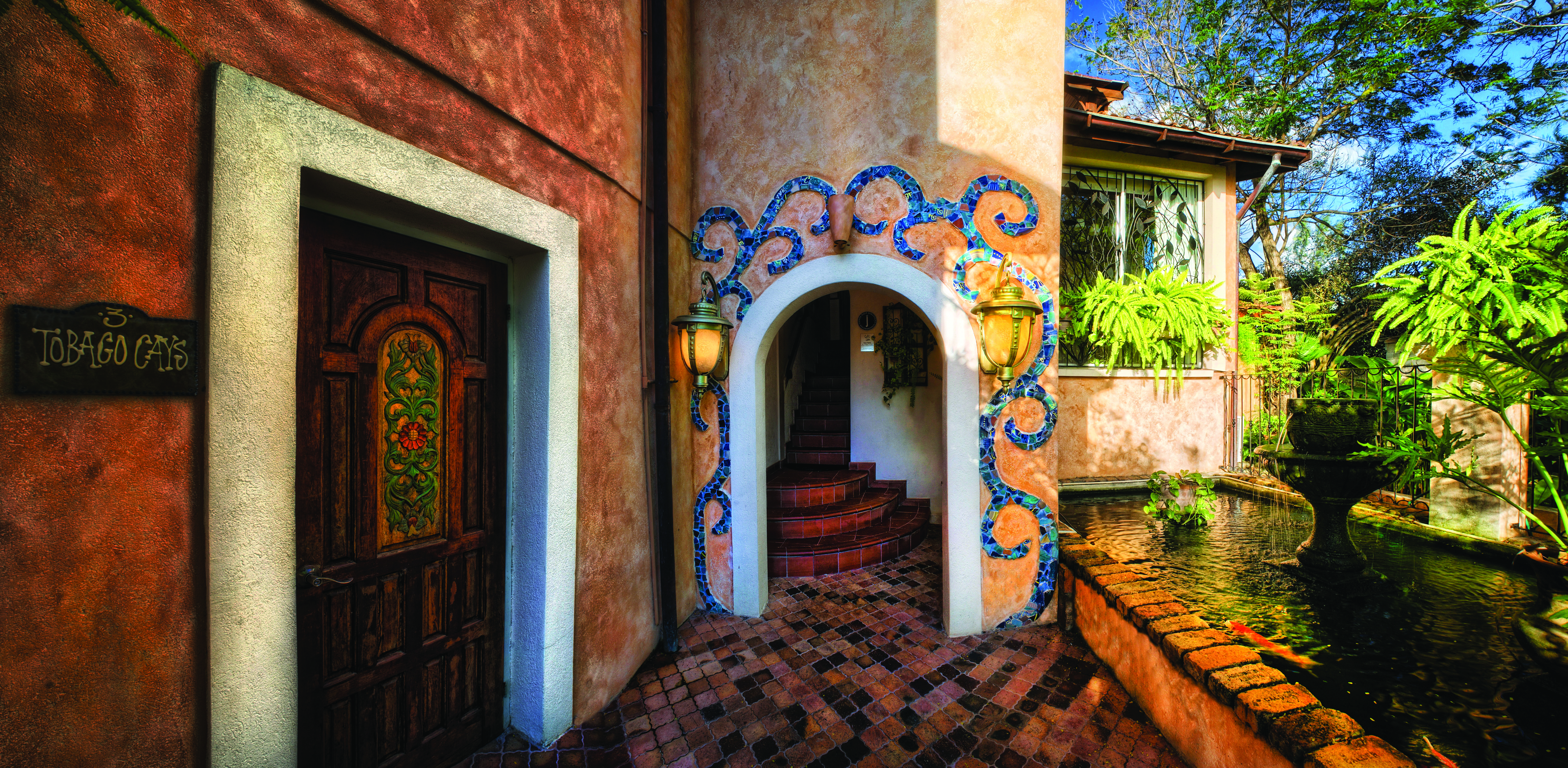 Little Arches Barbados entrance ornate doorway entrance pond and water feature