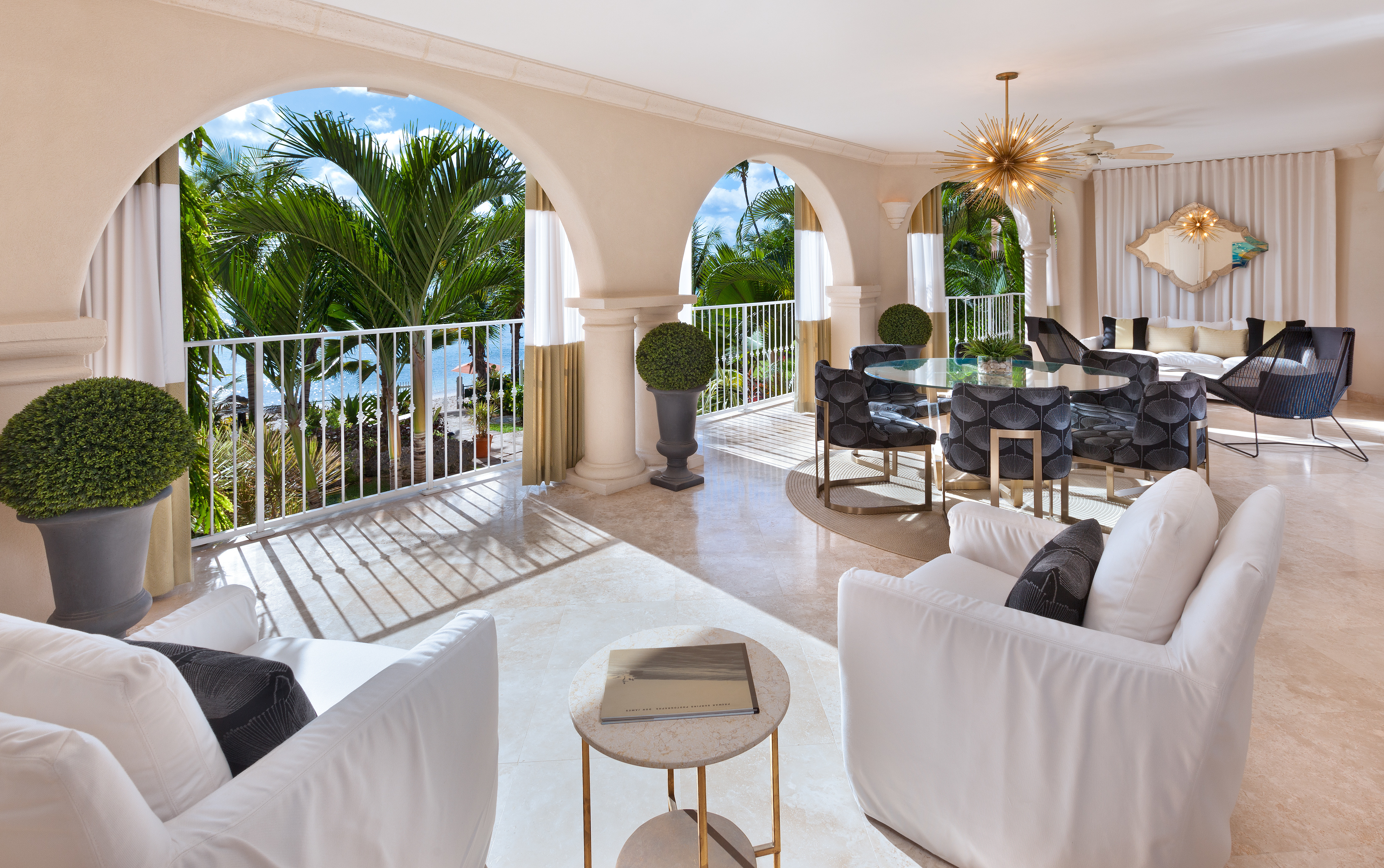 St Peters Bay beachfront house lounge, sofas armchairs, bright decor