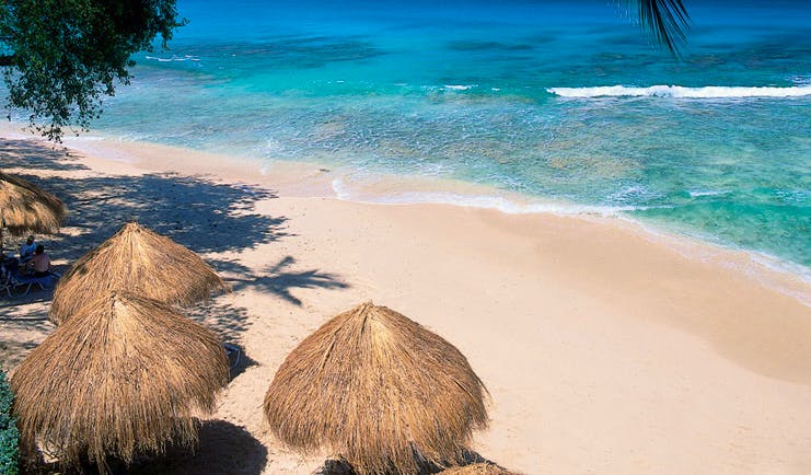 Tamarind Barbados aerial shot of beach cabanas white sand