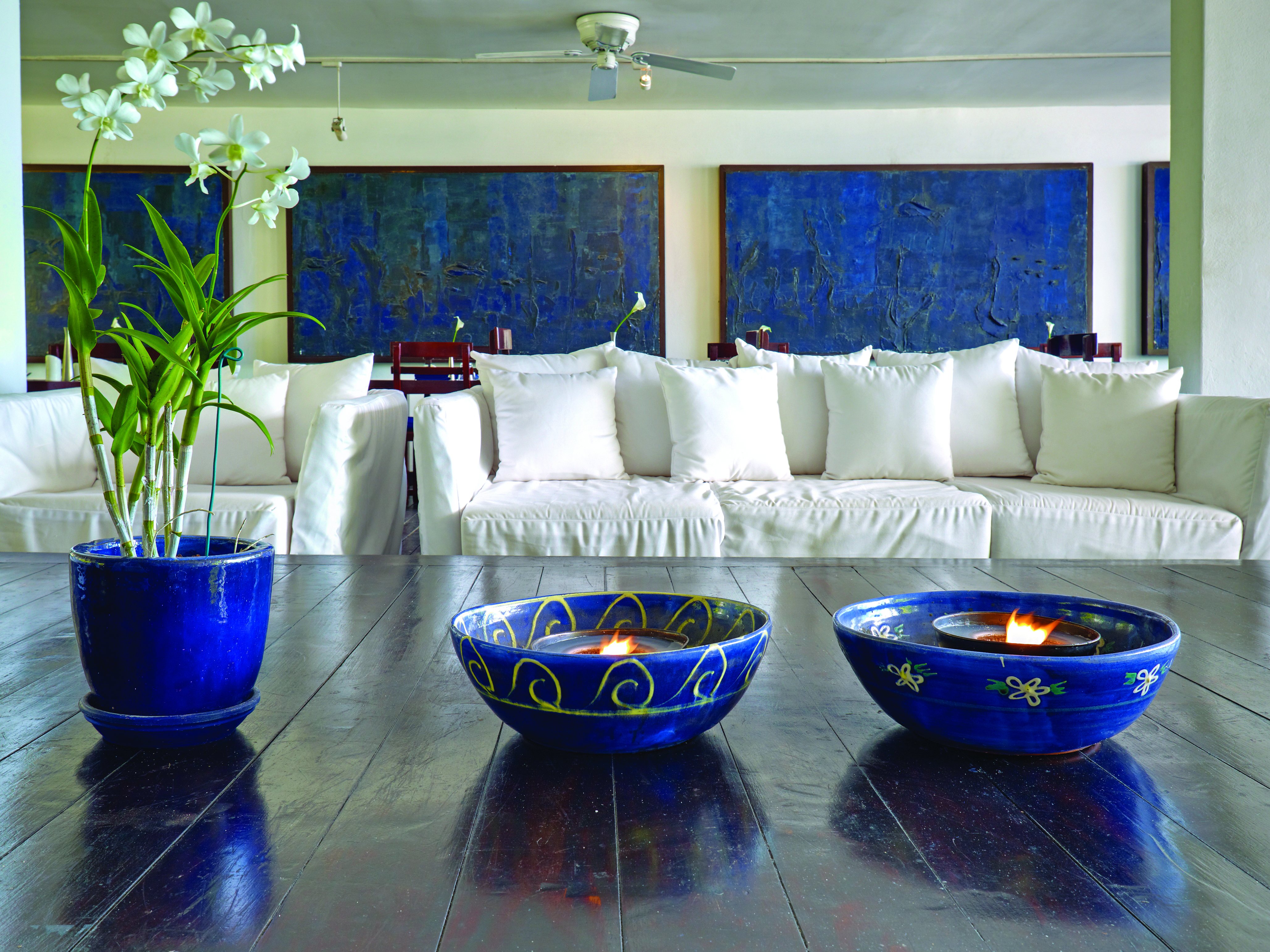 The House Barbados lobby white sofas coffee tables with plants and blue bowls