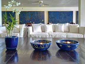 The House Barbados lobby white sofas coffee tables with plants and blue bowls