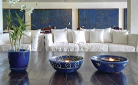 The House Barbados lobby white sofas coffee tables with plants and blue bowls