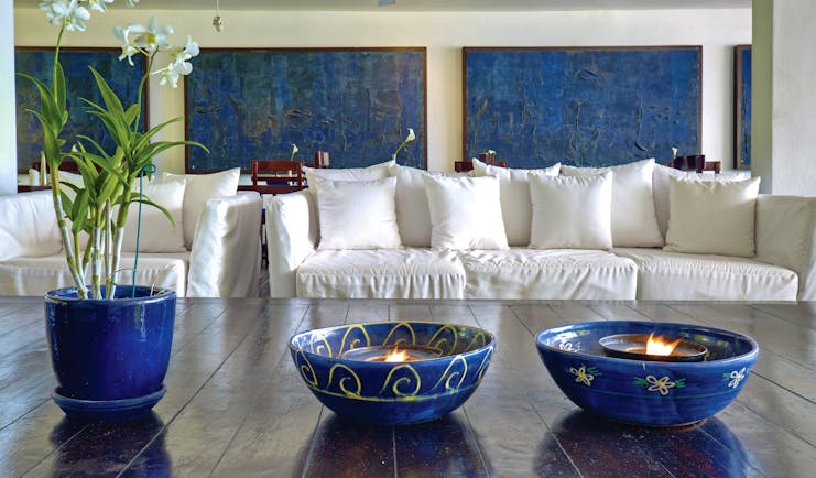The House Barbados lobby white sofas coffee tables with plants and blue bowls