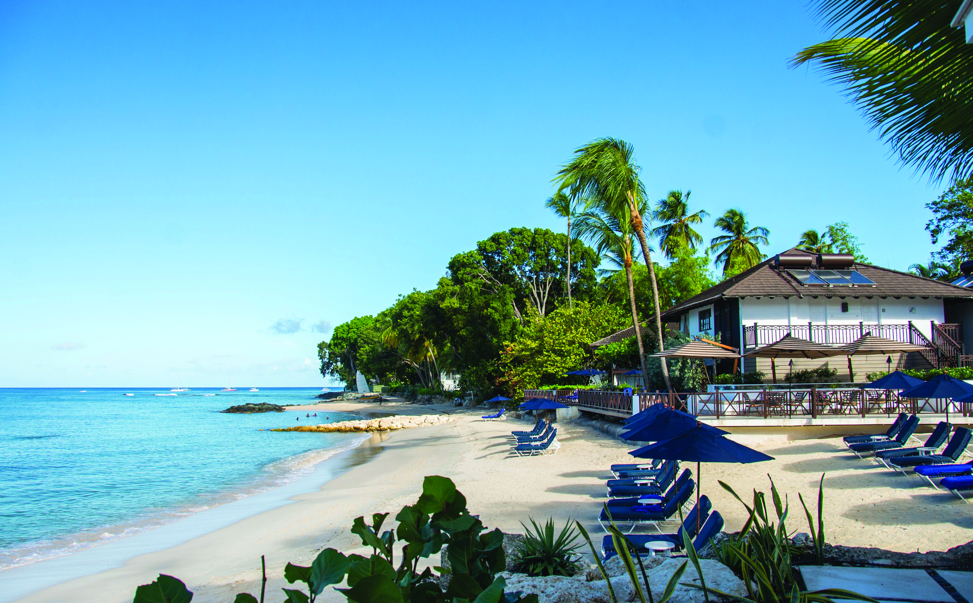 Sandpiper Barbados beach with sun loungers and umbrellas 