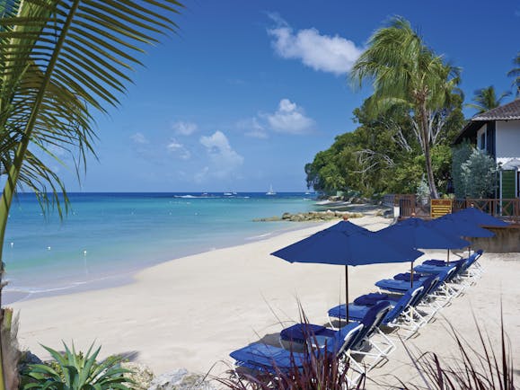 Sandpiper Barbados  beach sun loungers and umbrellas