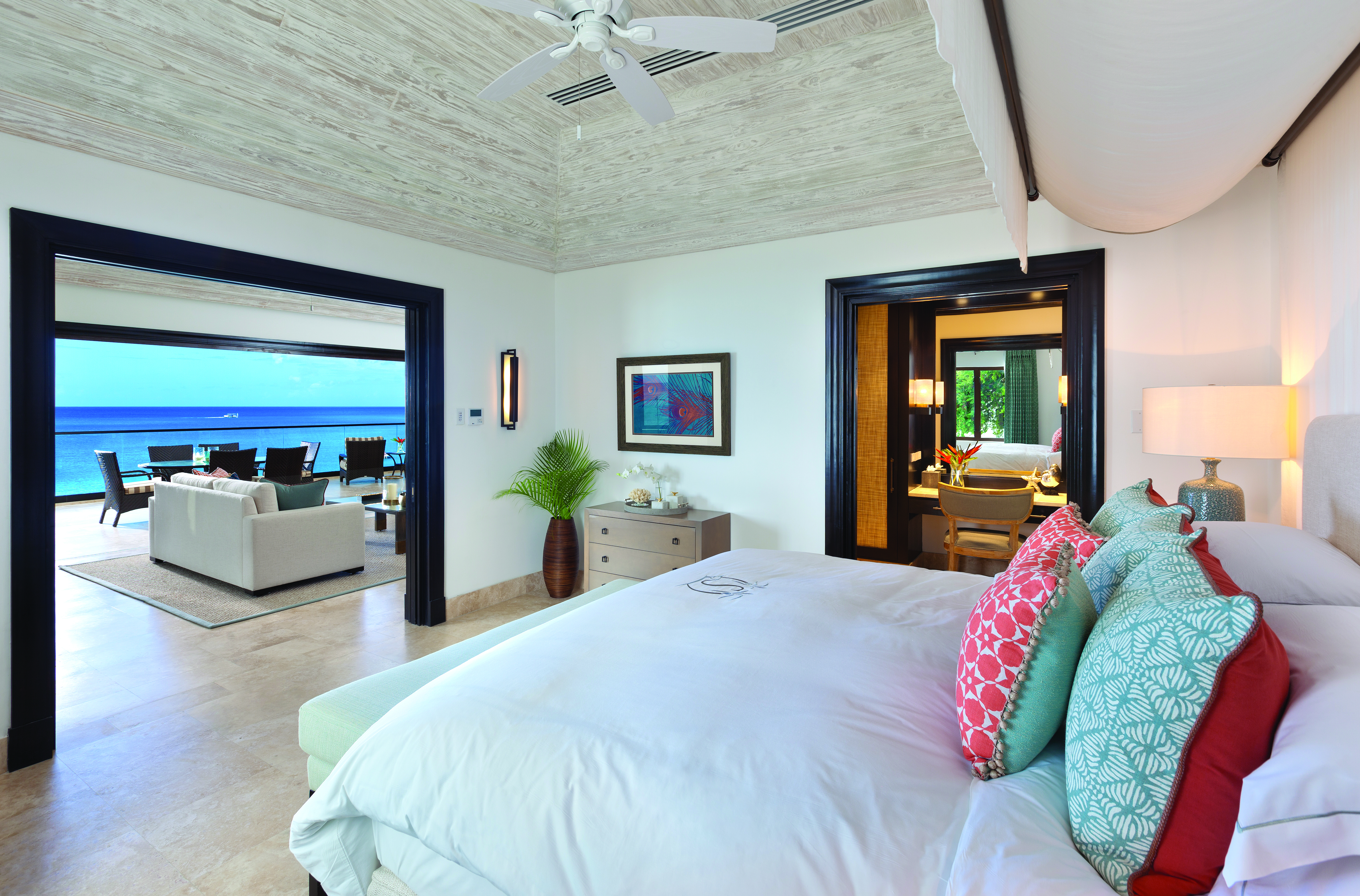 Sandpiper Barbados Curlew Suite bedroom leading to lounge area overlooking the beach
