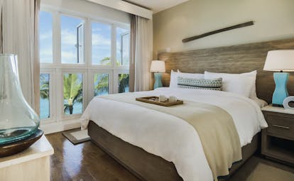 Waves Barbados standard room double bed windows looking out to ocean views