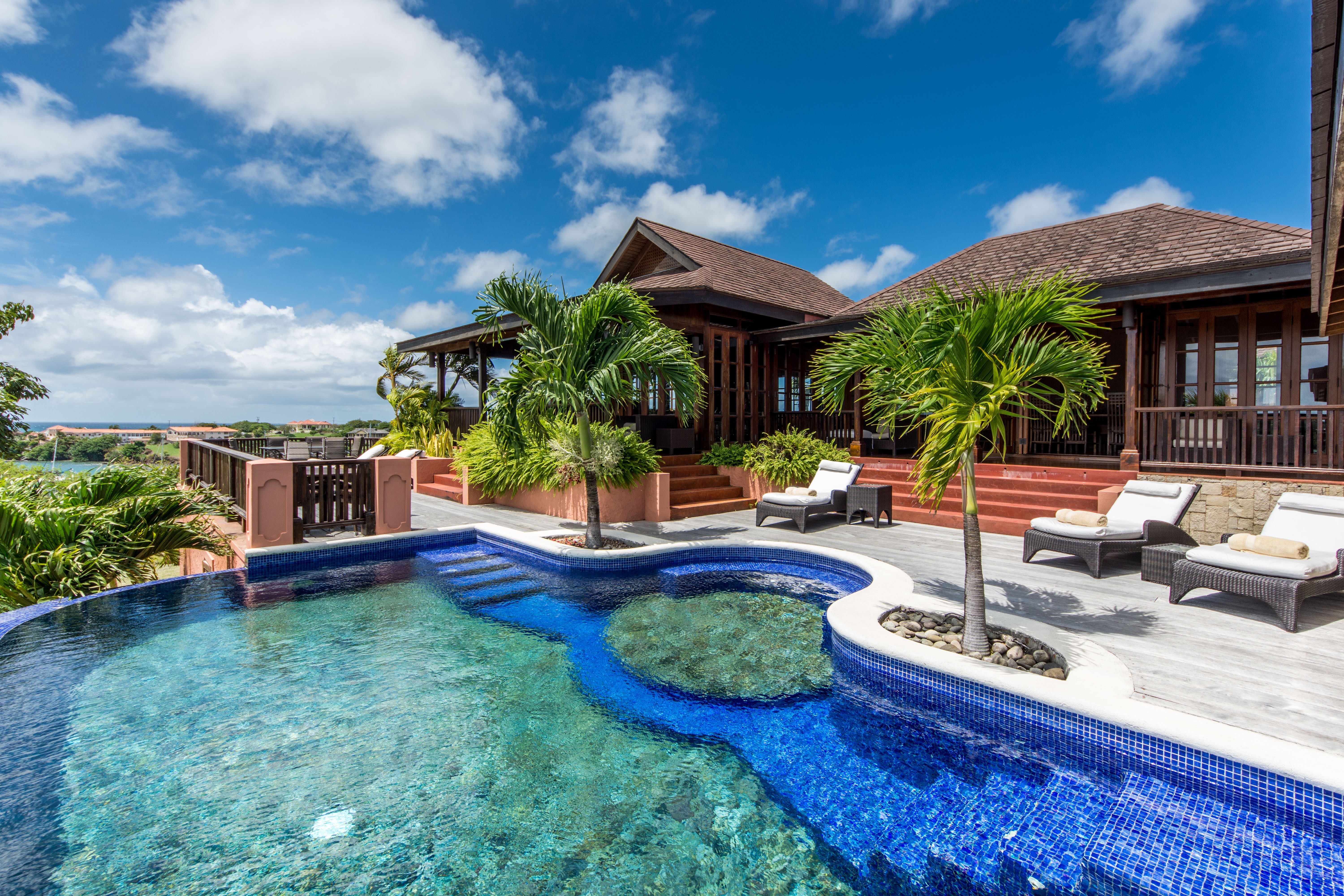 Villa with pool and palm trees
