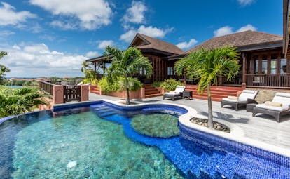 Villa with pool and palm trees