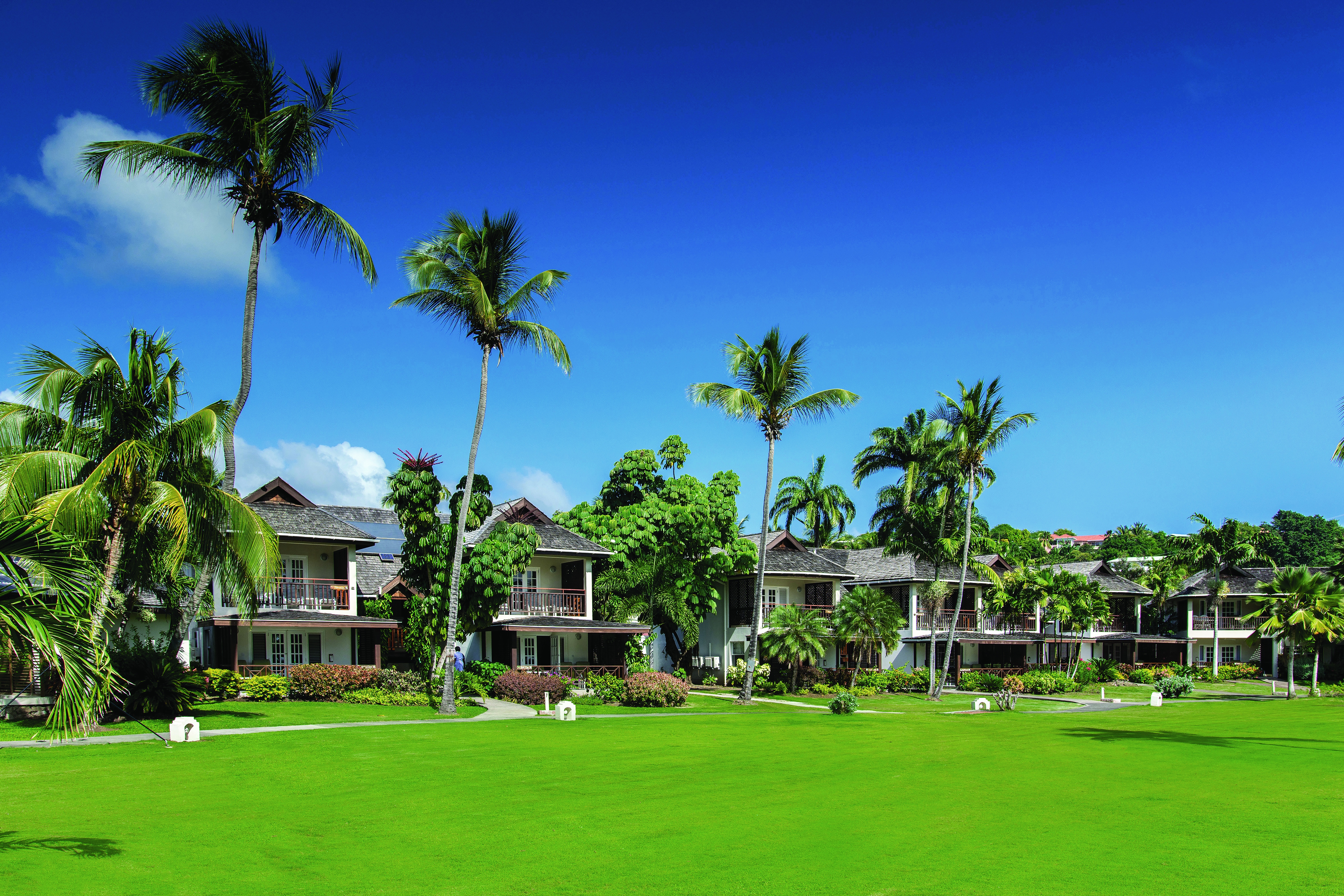 Calabash Grenada hotel exterior palm trees green lawns