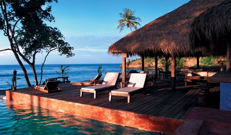 Laluna Grenada ocean side terrace outdoor seating area on the water