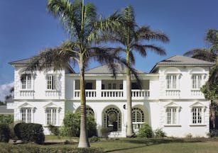 Half Moon Jamaica villa exterior building lawns palm trees