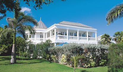 Half Moon Jamaica villa exterior and gardens lawns and trees
