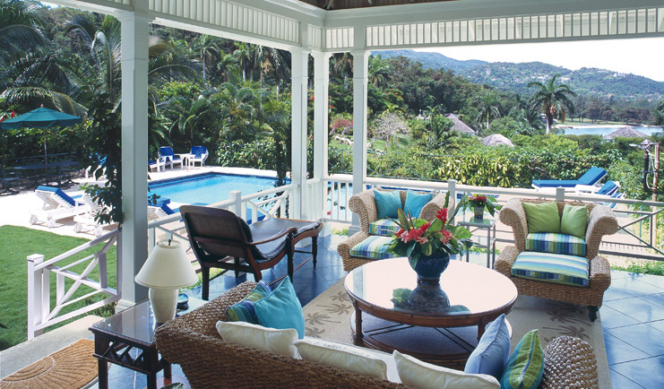 Round Hill Jamaica pineapple suite terrace large seating area pool in background