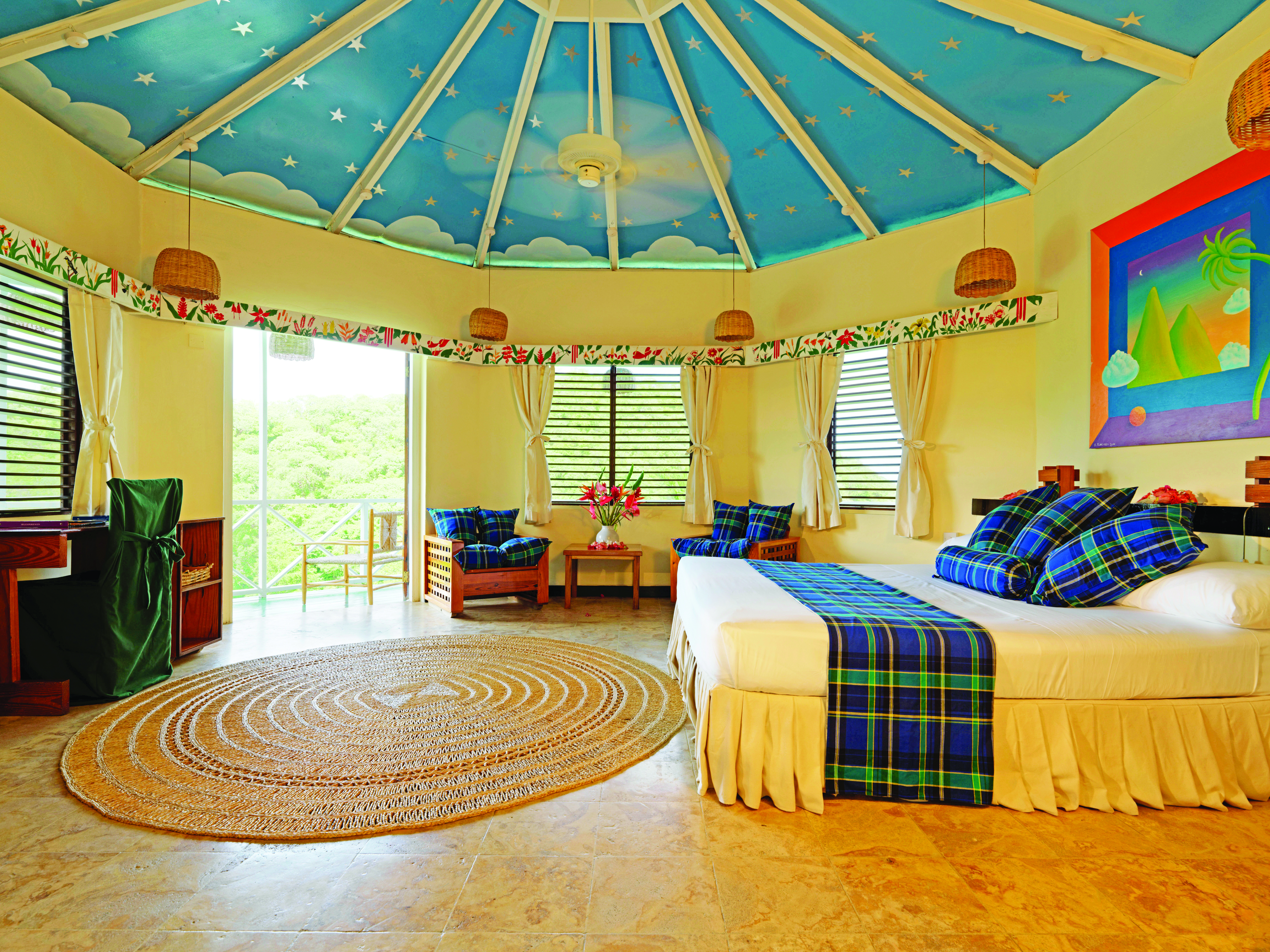 Anse Chastanet St Lucia superior bedroom king size bed  octagonal room balcony